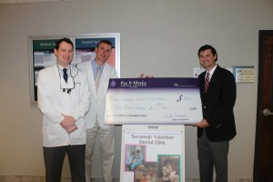 Fox & Weeks presents York Children's Foundation grant to volunteer dental clinic