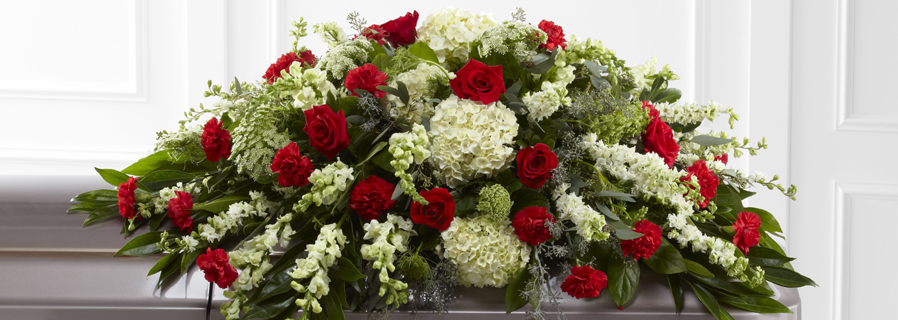 The meaning behind various funeral flowers : Fox & Weeks