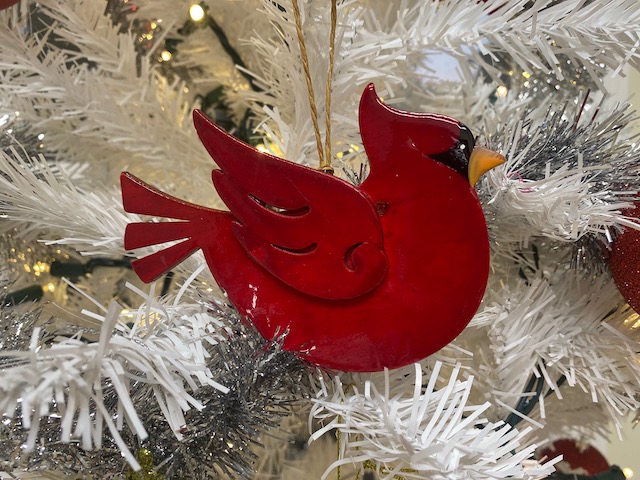 Fox & Weeks giving cardinal ornaments as gifts this holiday season